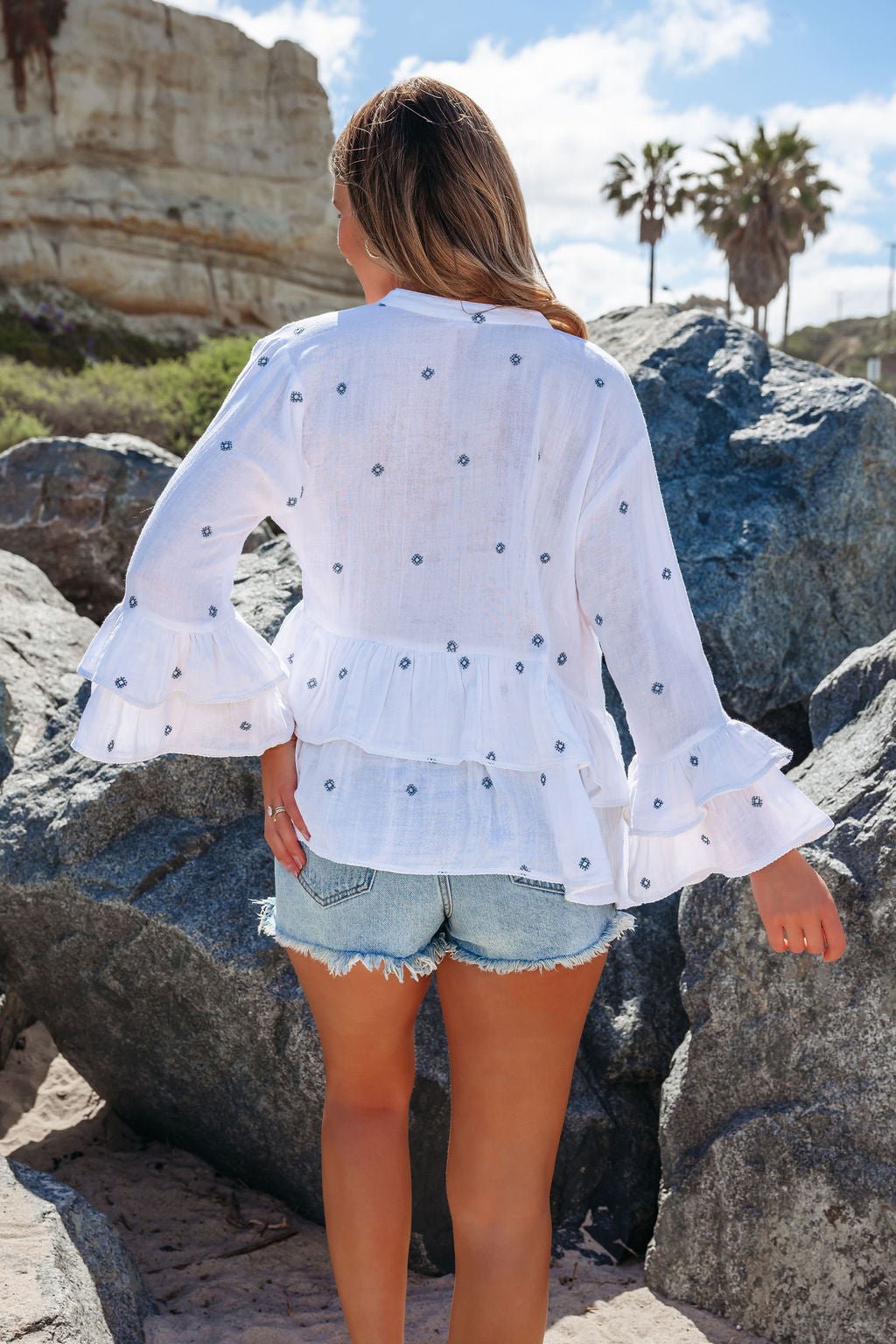 Ivory Ruffle Embroidery Detail Peplum Top