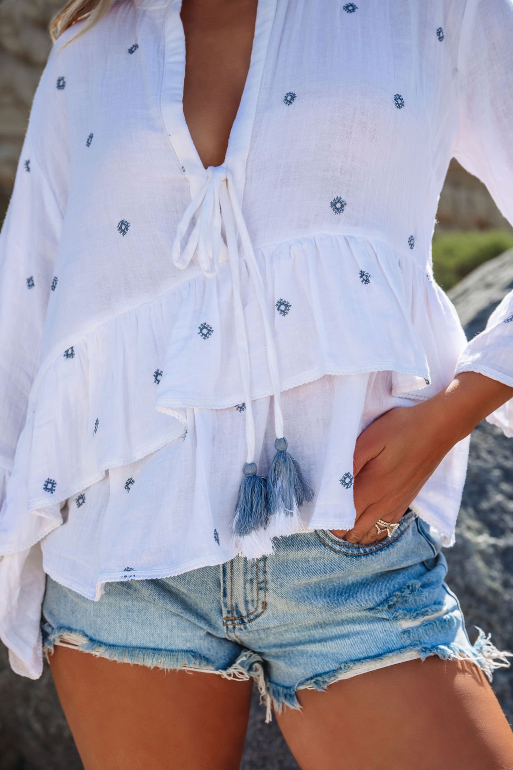 Ivory Ruffle Embroidery Detail Peplum Top